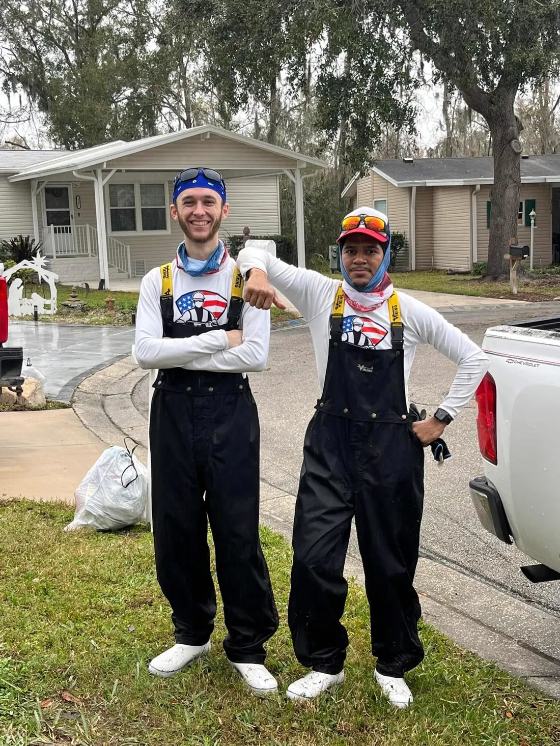 Wash Force founders Nicholas Randall and Adrian Ramirez side by side on a job site